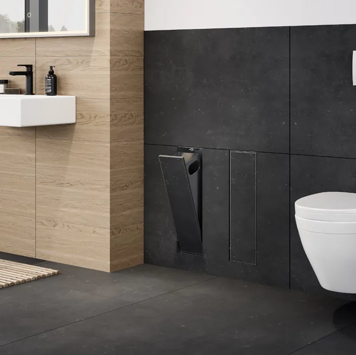 Abfallbeh&auml;lter fl&auml;chenb&uuml;ndig in der Wand neben dem WC